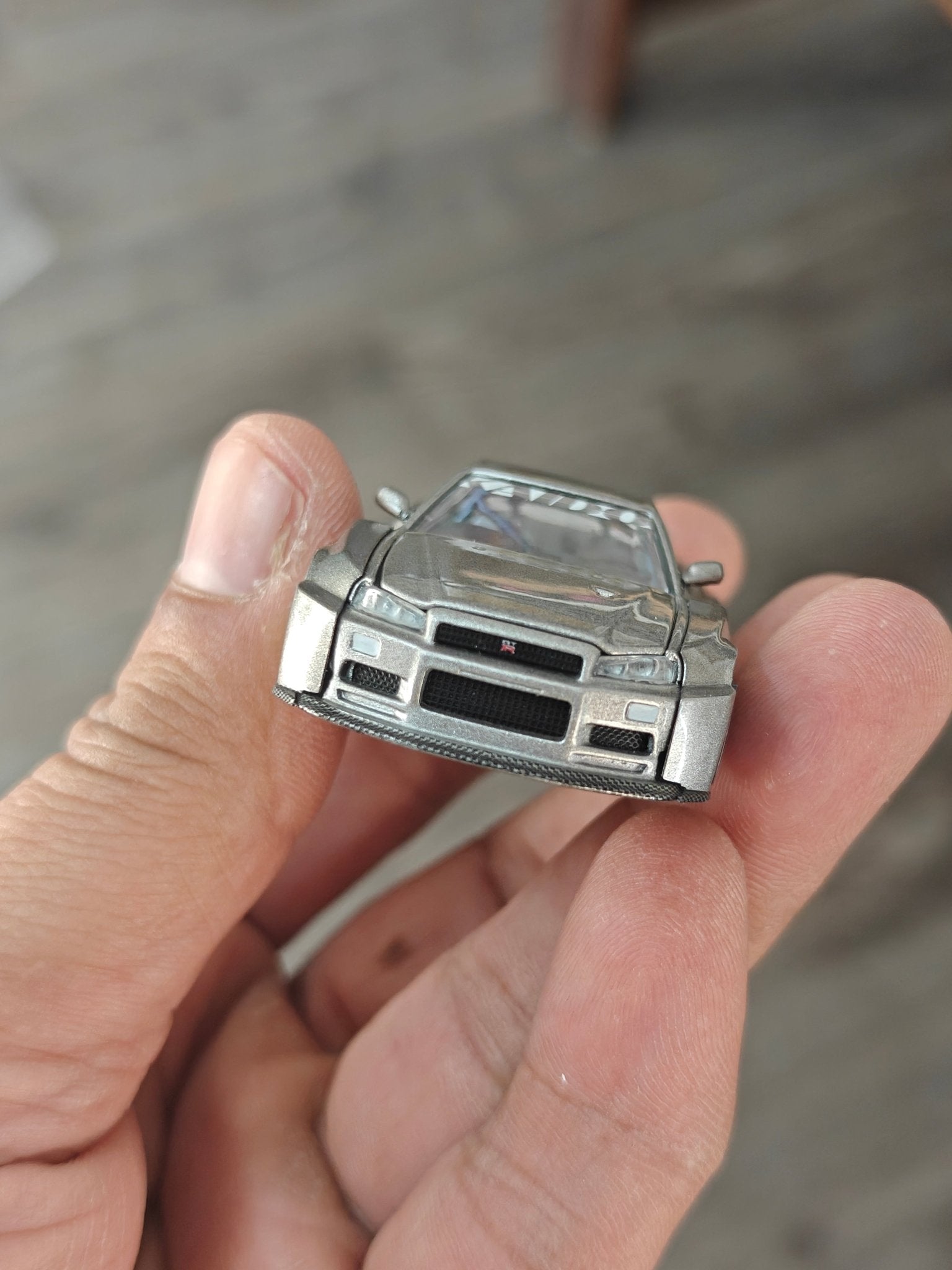 Mini GT Nissan Skyline GT - R (R34) Kaido Works Shinjuku V1 (Open Box) - Kinder Logs
