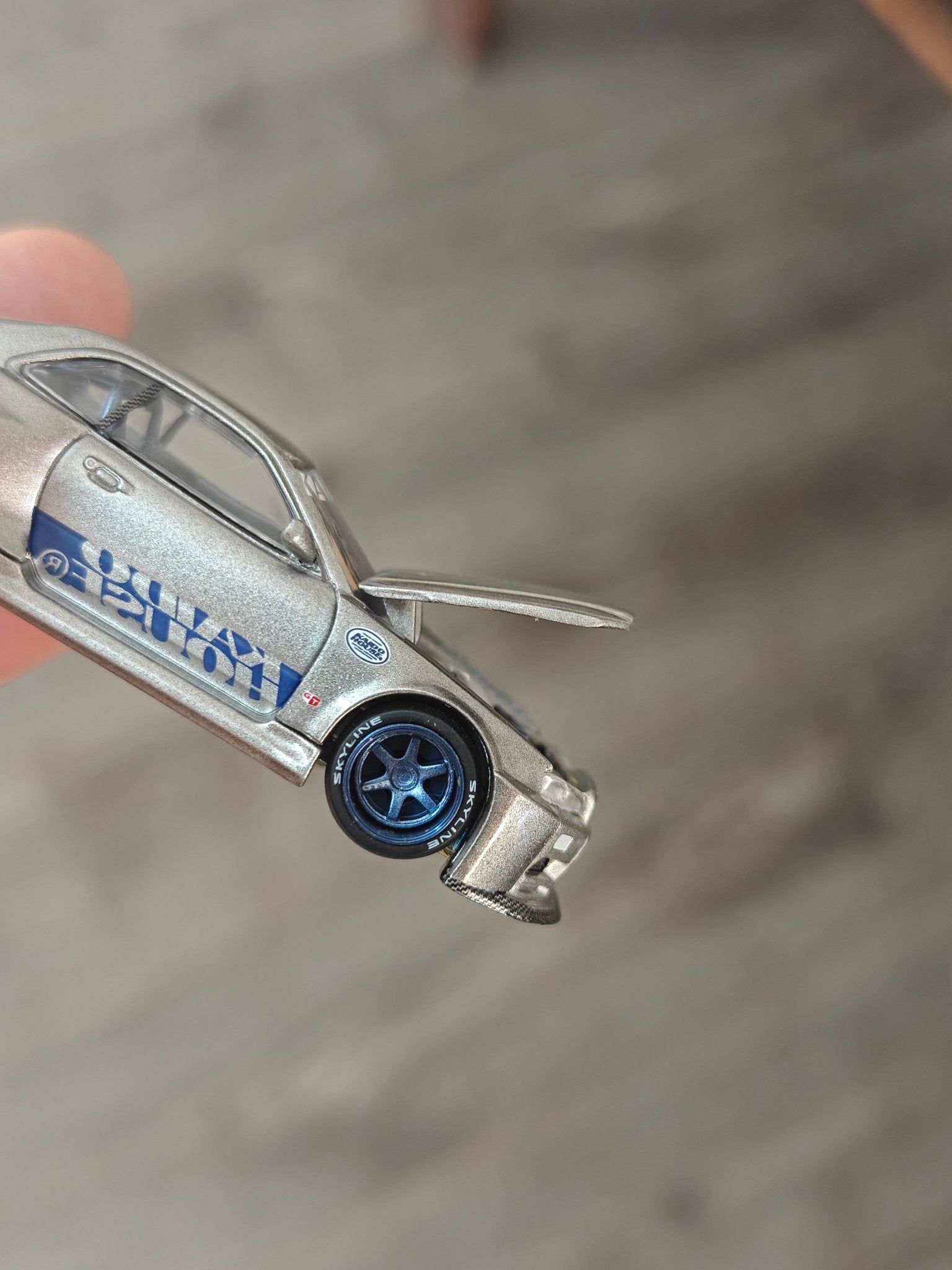 Mini GT Nissan Skyline GT - R (R34) Kaido Works Shinjuku V1 (Open Box) - Kinder Logs