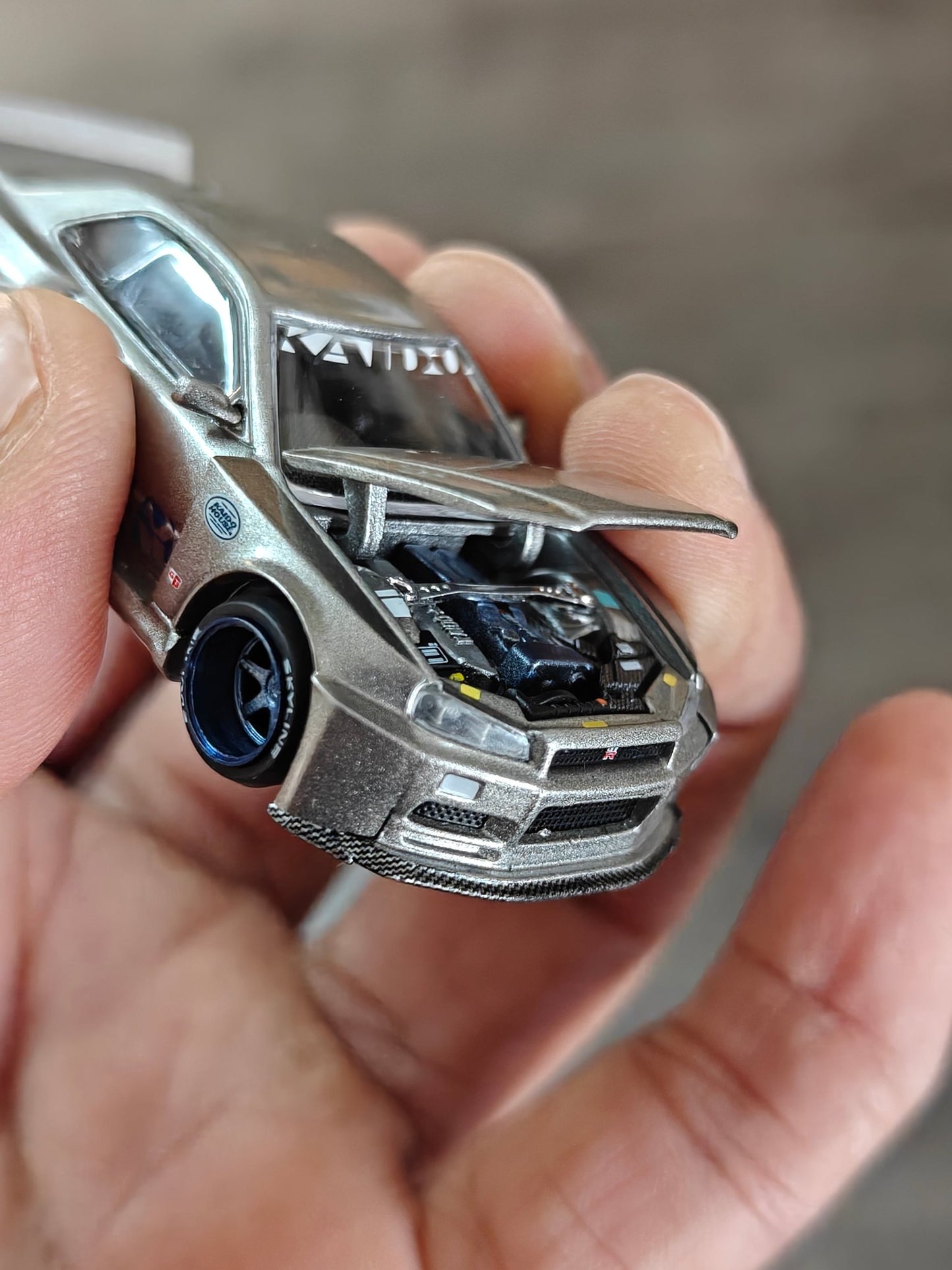 Mini GT Nissan Skyline GT - R (R34) Kaido Works Shinjuku V1 (Open Box) - Kinder Logs