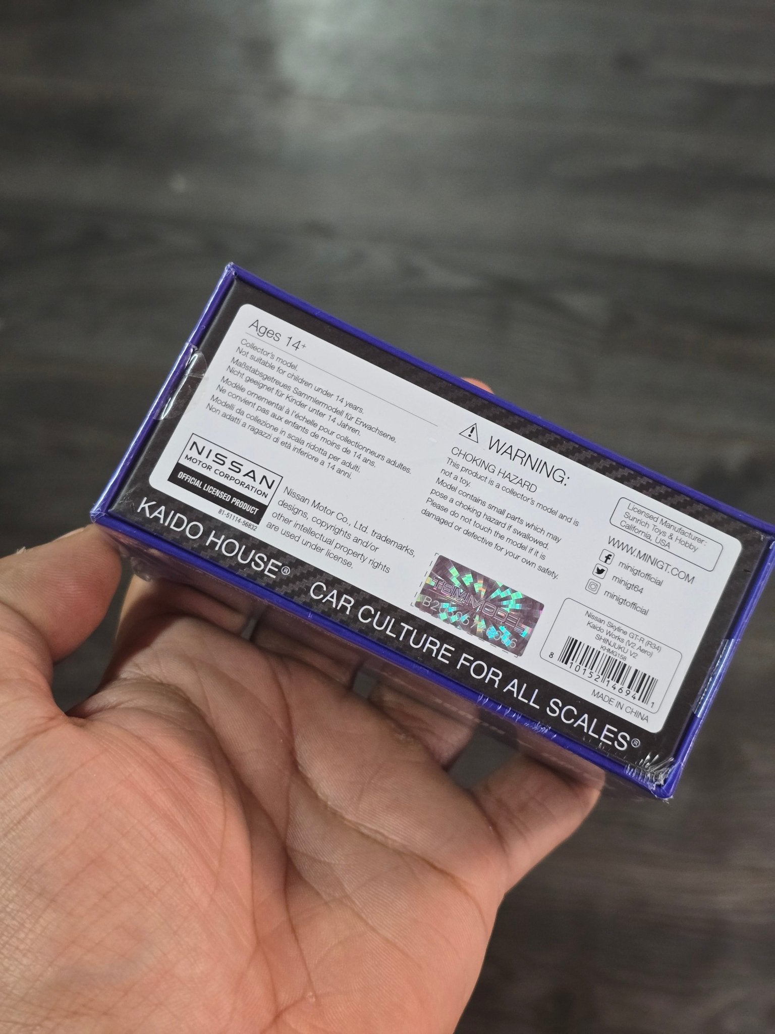 Mini GT Nissan Skyline GT - R (R34) Kaido Works Shinjuku V2 (Blue) - Kinder Logs