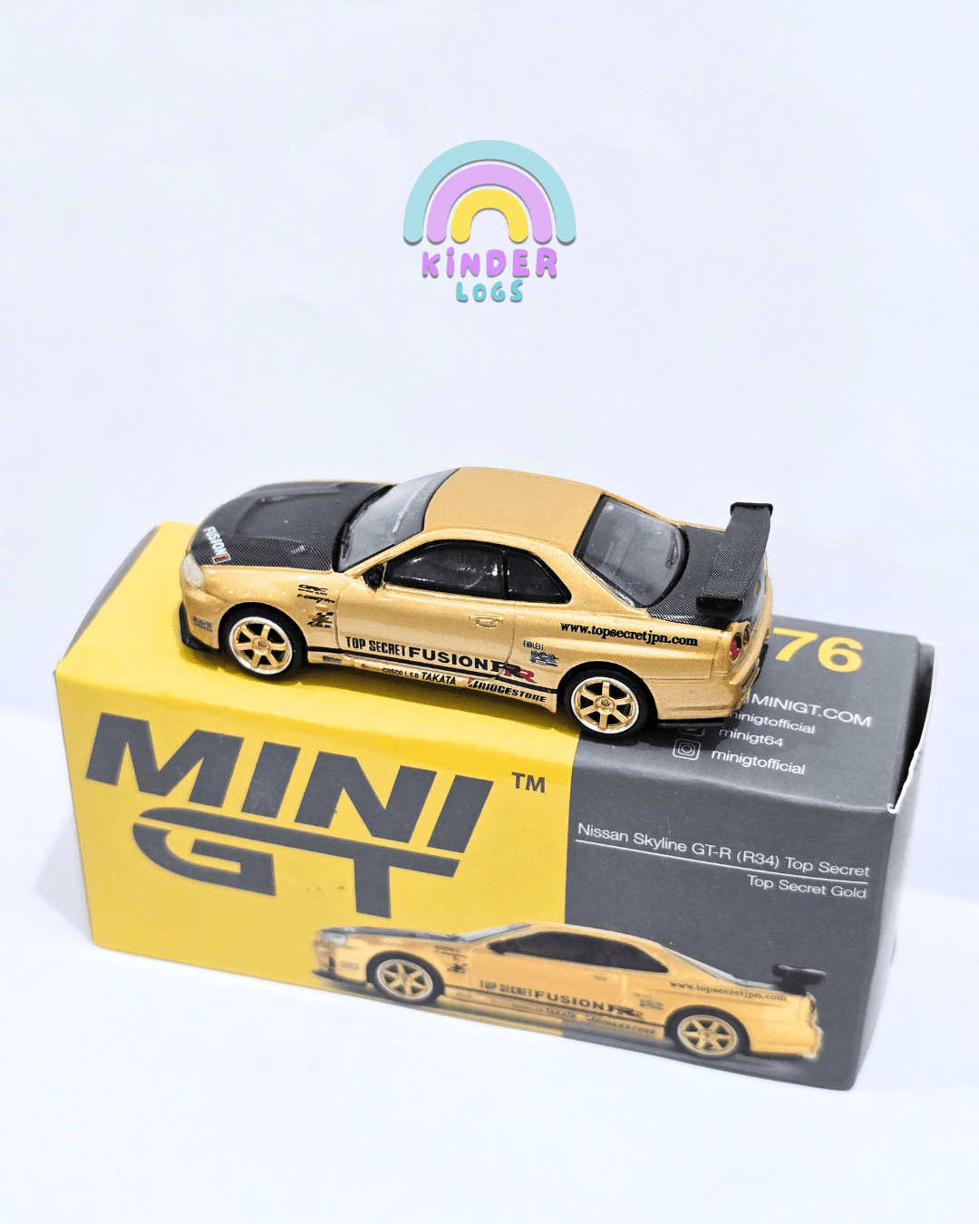 Mini GT Nissan Skyline GT - R (R34) Top Secret Gold - Open Box - Kinder Logs