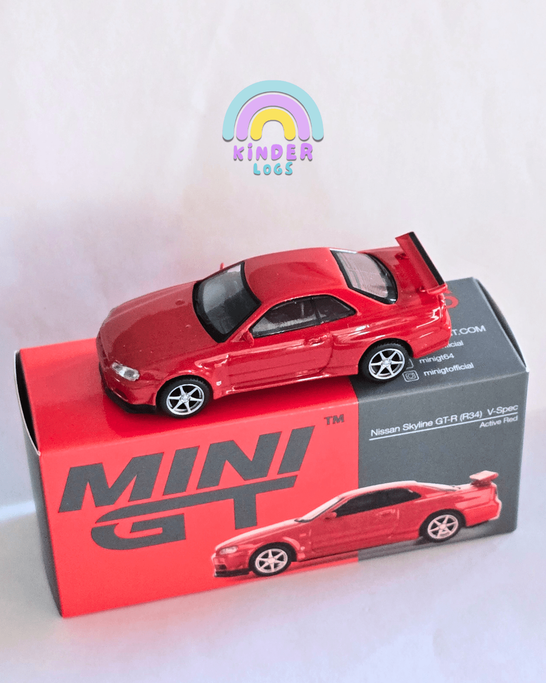 Mini GT Nissan Skyline GT - R (R34) V - Spec - Active Red (Open Box) - Kinder Logs