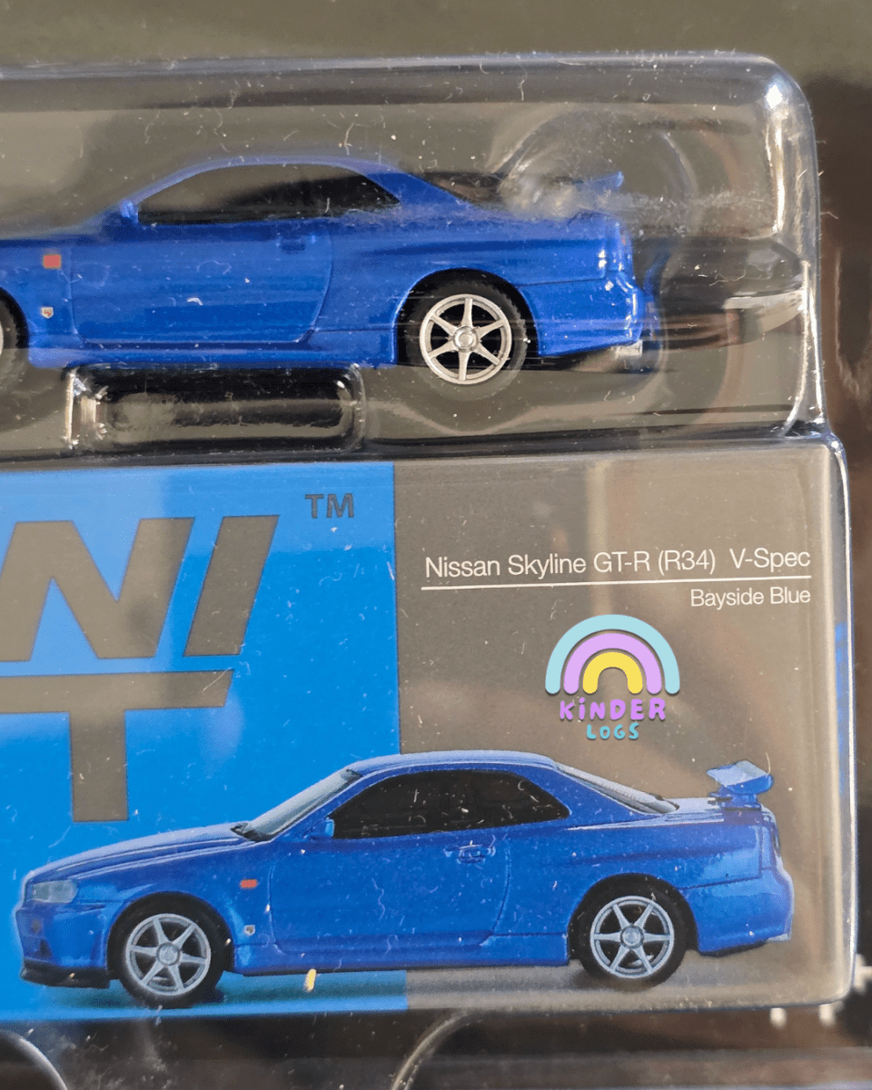 Mini GT Nissan Skyline GT - R (R34) V - Spec - Bayside Blue - Mijo Exclusives - Kinder Logs