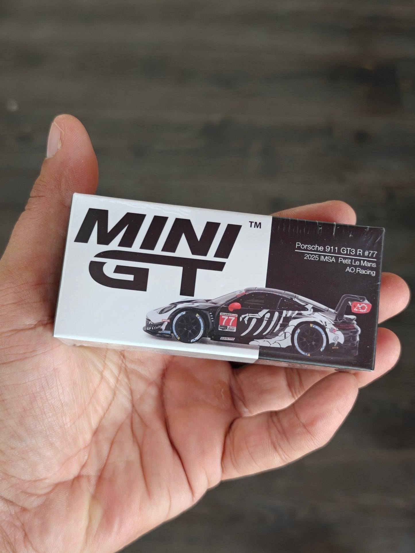 Mini GT REXY Skeleton Porsche 911 GT3 R 77 - Kinder Logs