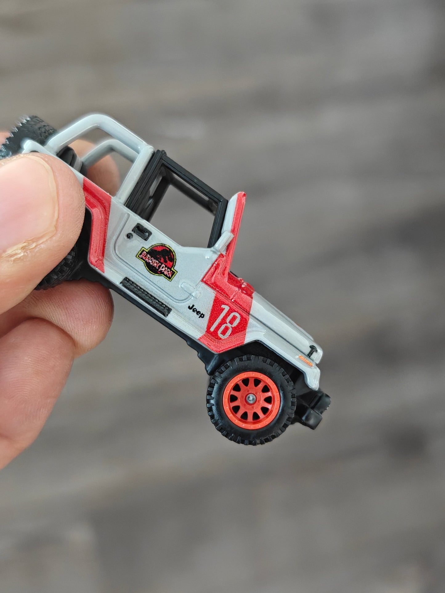 Premium Hot Wheels 1992 Jeep Wrangler Sahara Jurassic Park (Uncarded - New) - Kinder Logs