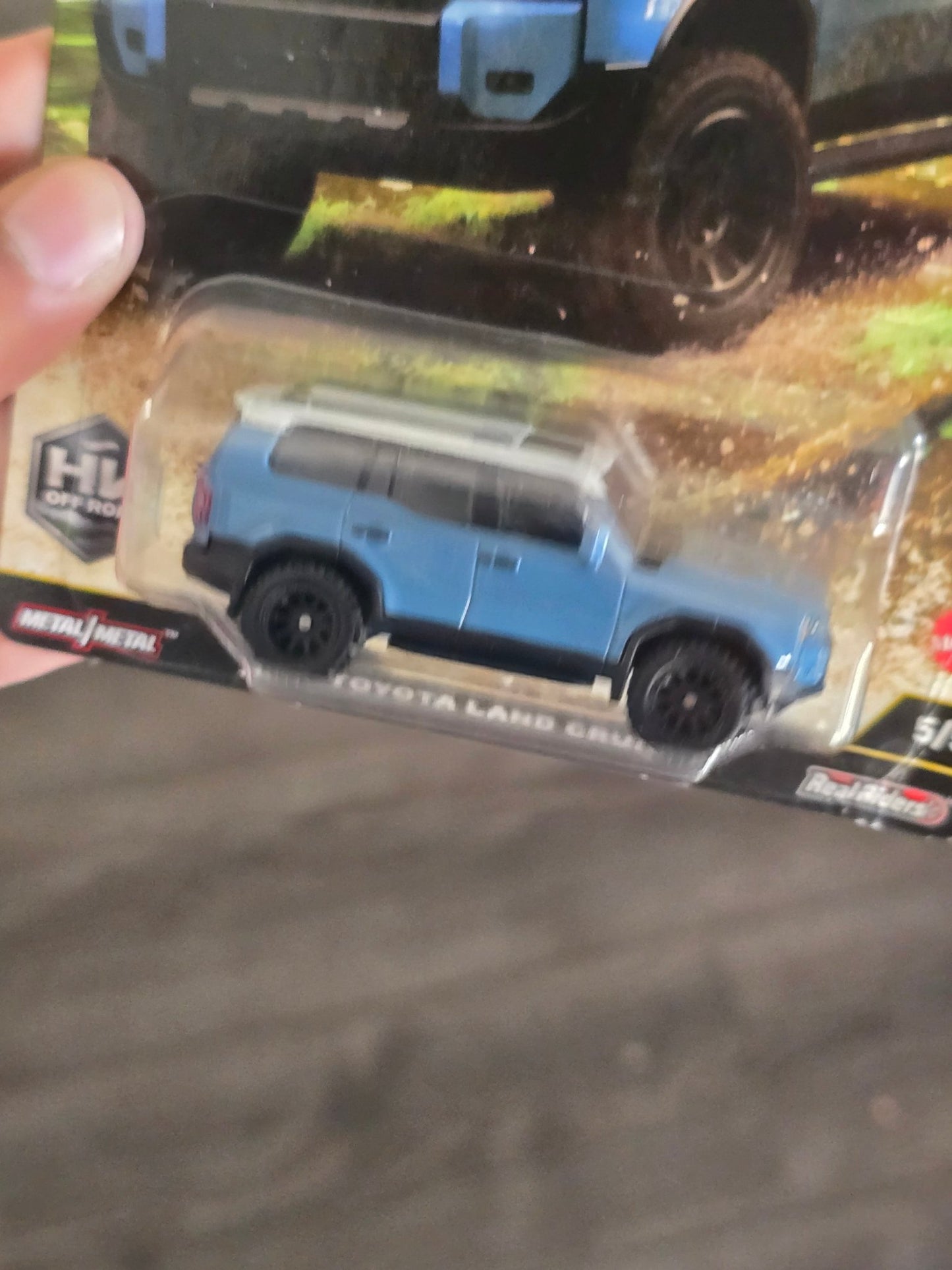 Premium Hot Wheels 2024 Toyota Land Cruiser - Blue (Creased Card) - Kinder Logs