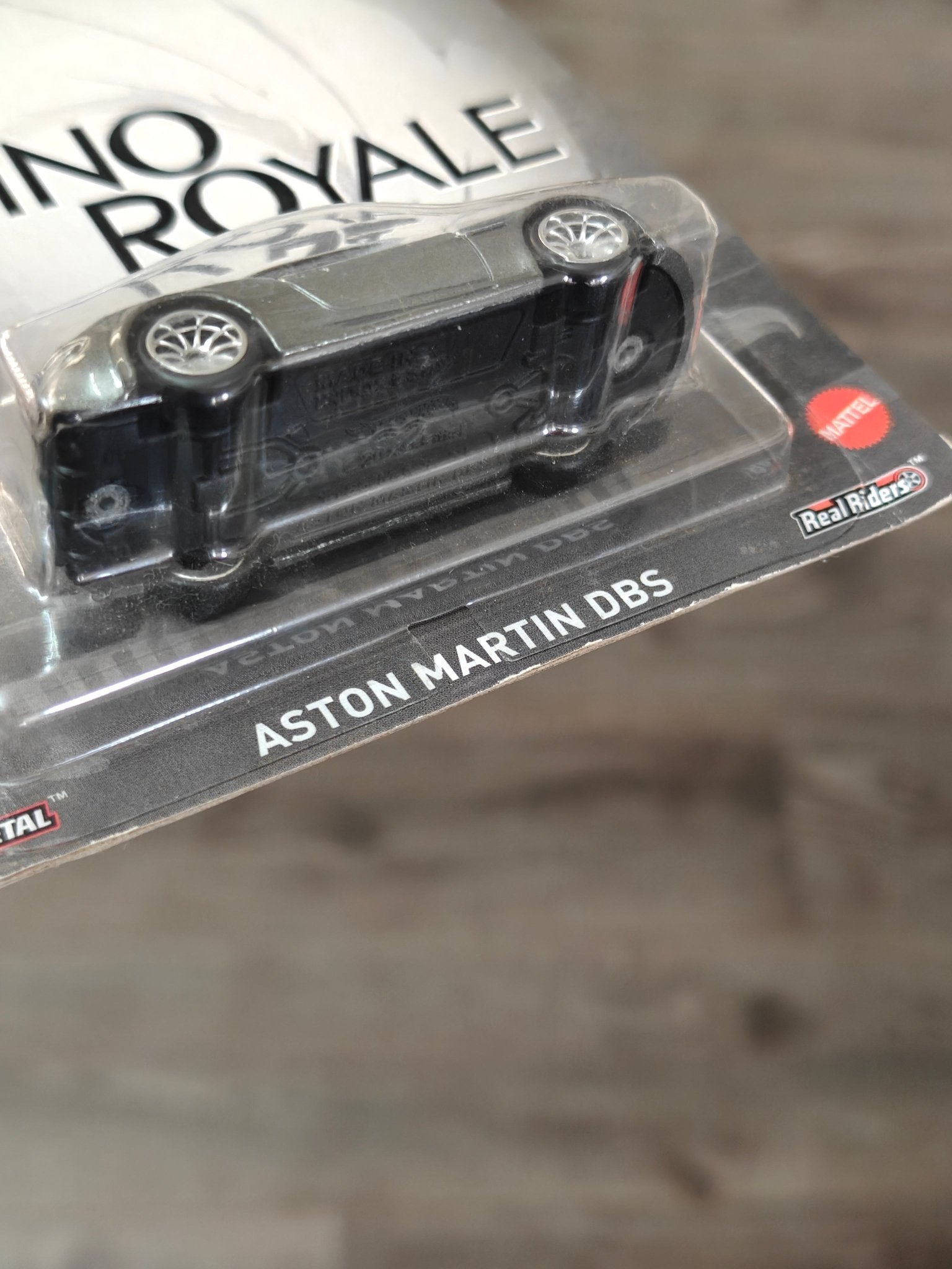 Premium Hot Wheels Aston Martin DBS - James Bond 007 Casino Royale (Imported) - Kinder Logs