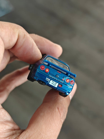 Premium Hot Wheels Nissan Skyline GT - R BNR34 - Blue (Uncarded - New) - Kinder Logs