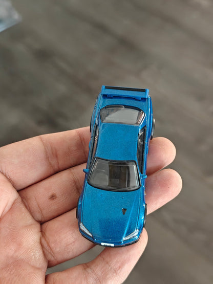 Premium Hot Wheels Nissan Skyline GT - R BNR34 - Blue (Uncarded - New) - Kinder Logs
