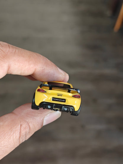 Premium Hot Wheels Porsche 718 Cayman GT4 - Deutschland Design (Uncarded - New) - Kinder Logs