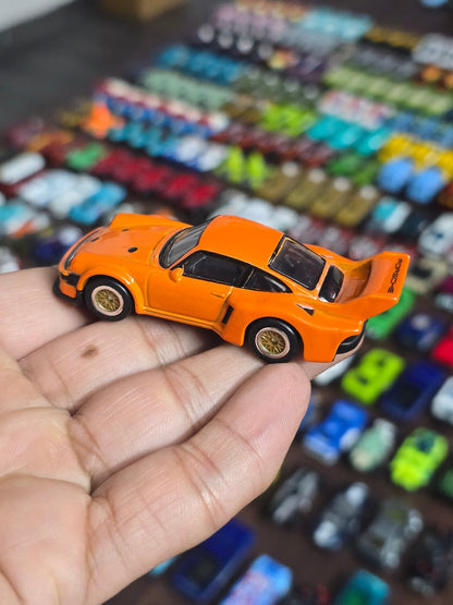 Premium Hot Wheels Porsche 934.5 - Orange (Uncarded - New) - Kinder Logs