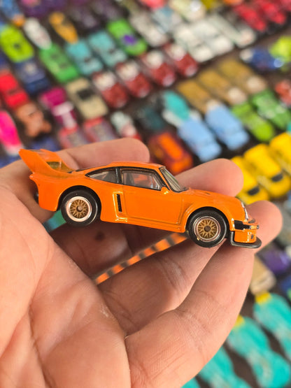 Premium Hot Wheels Porsche 934.5 - Orange (Uncarded - New) - Kinder Logs