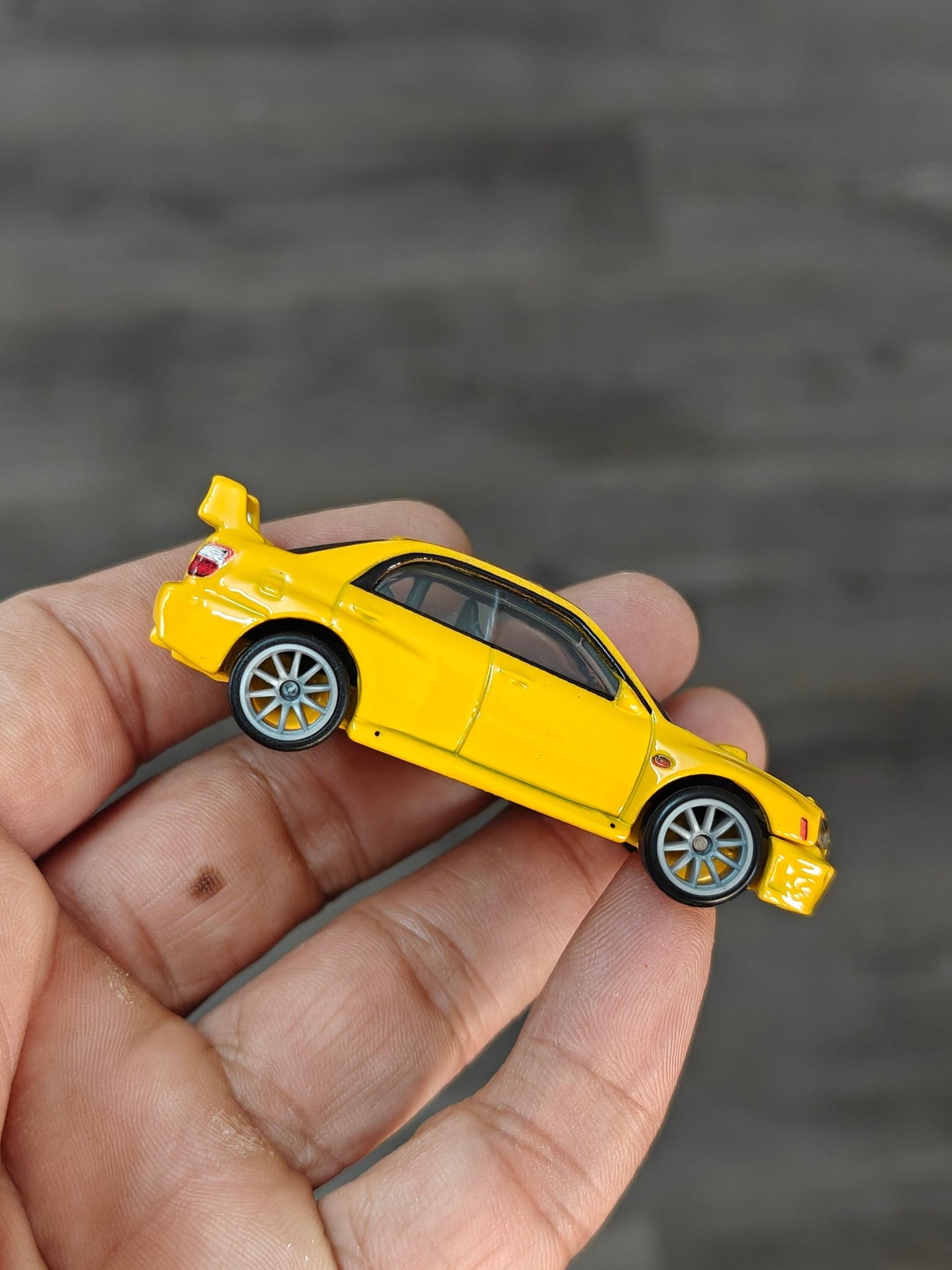 Premium Hot Wheels Subaru Impreza WRX - Yellow (Uncarded - New) - Kinder Logs