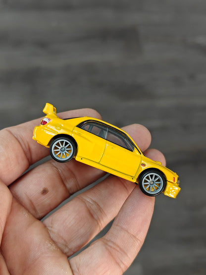 Premium Hot Wheels Subaru Impreza WRX - Yellow (Uncarded - New) - Kinder Logs