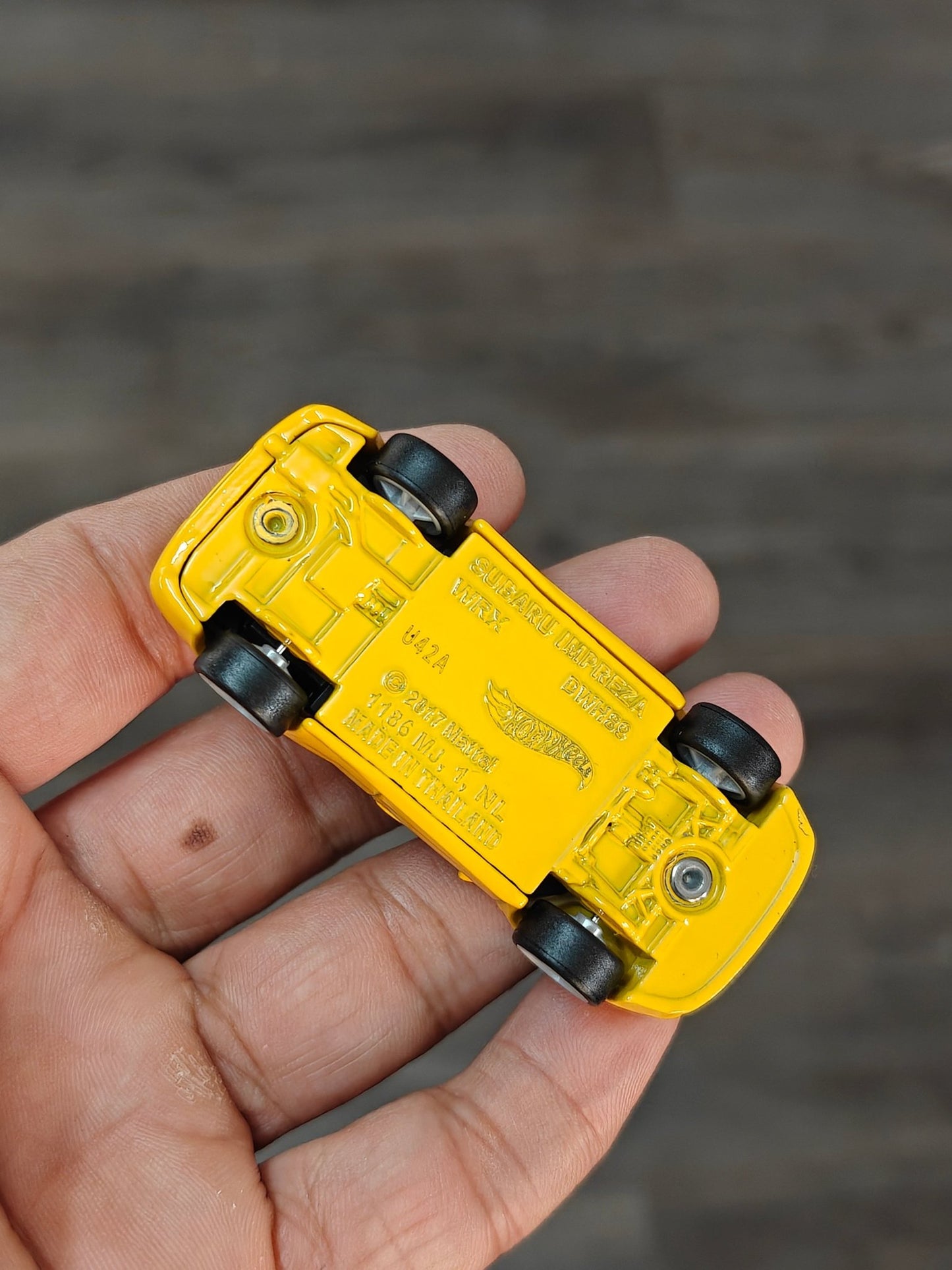 Premium Hot Wheels Subaru Impreza WRX - Yellow (Uncarded - New) - Kinder Logs