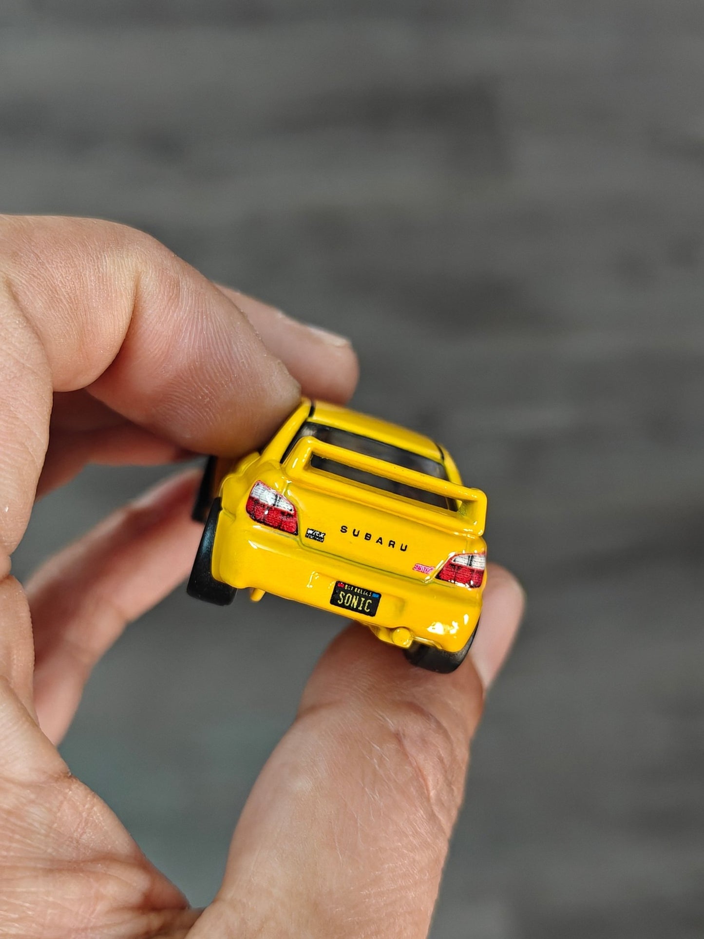Premium Hot Wheels Subaru Impreza WRX - Yellow (Uncarded - New) - Kinder Logs