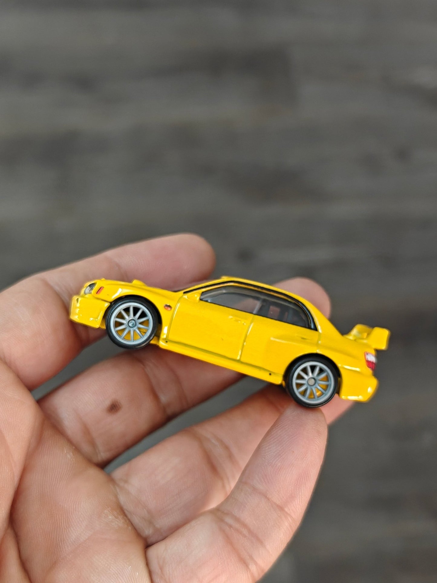 Premium Hot Wheels Subaru Impreza WRX - Yellow (Uncarded - New) - Kinder Logs