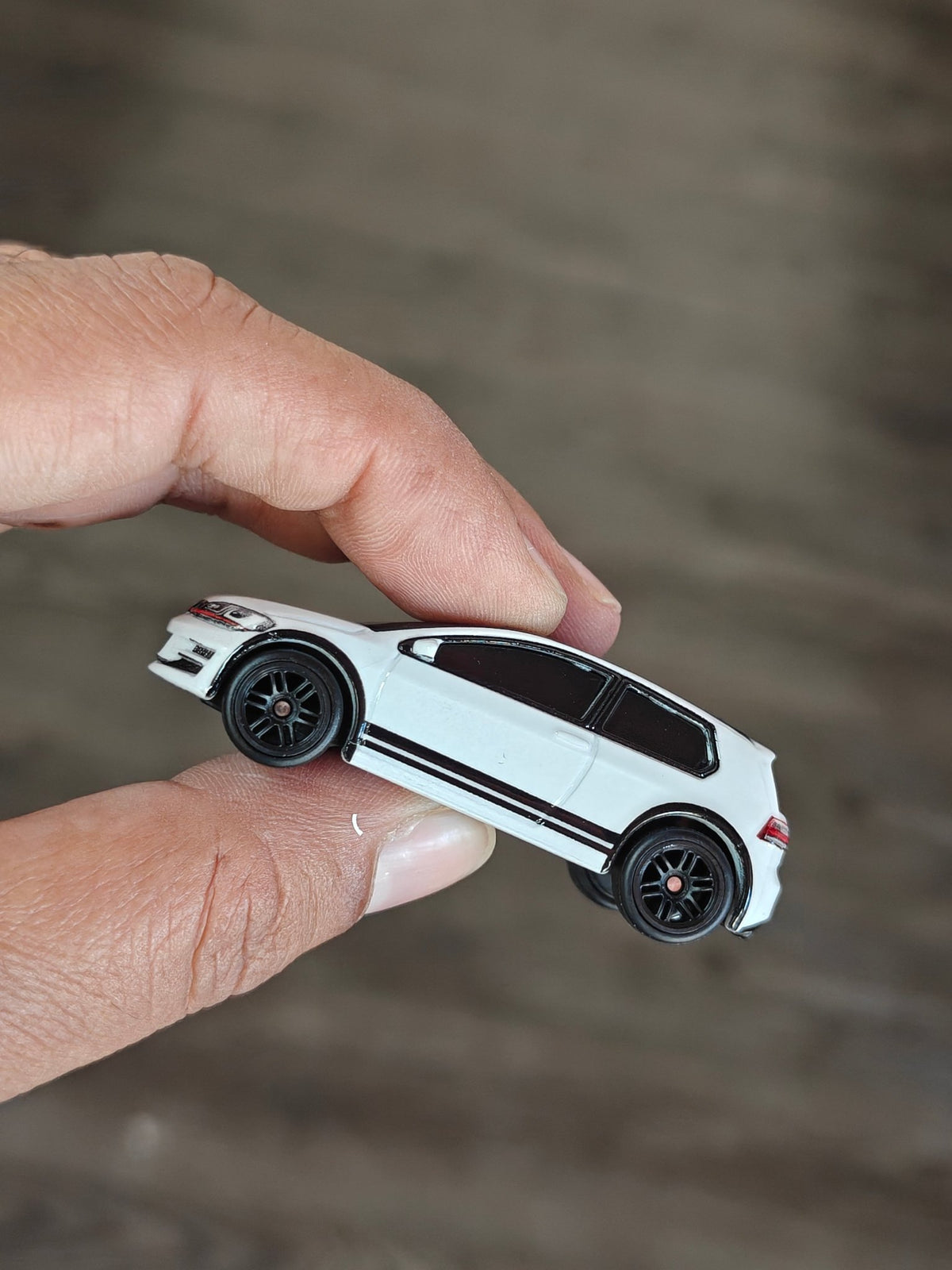 Premium Hot Wheels Volkswagen Golf MK7 GTI - Deutschland Design (Uncarded - New) - Kinder Logs