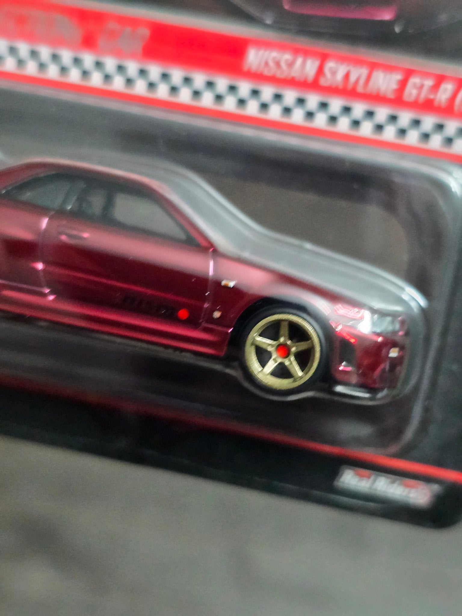 RLC Hot Wheels sELECTIONs Nissan Skyline GT - R BNR34 (Spectraflame Oxblood) - Kinder Logs