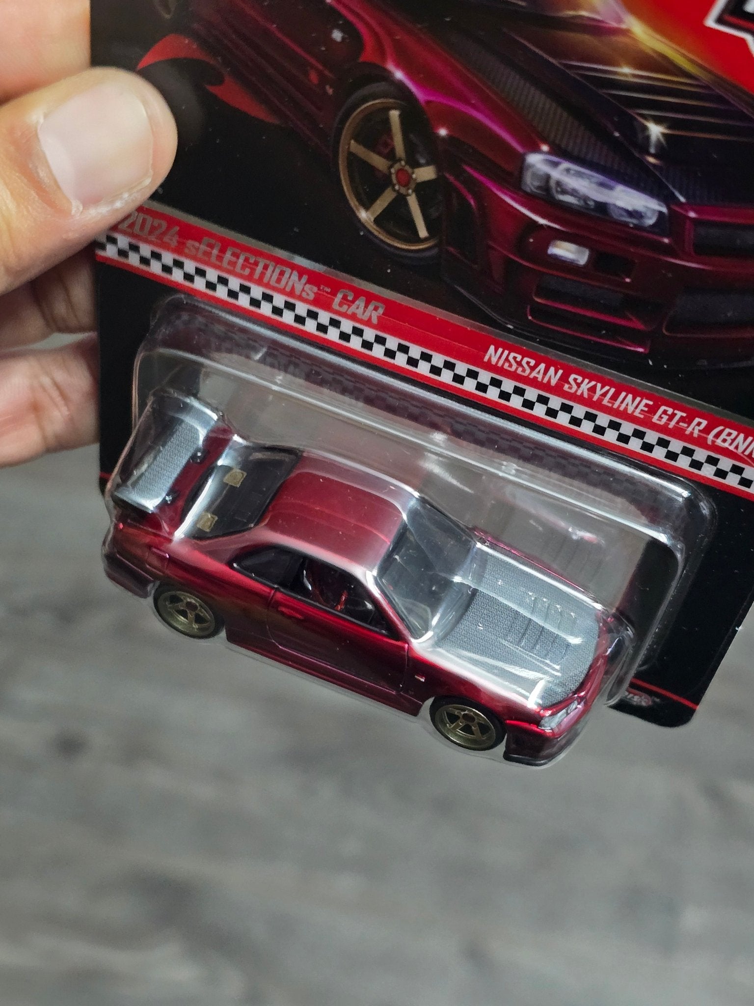 RLC Hot Wheels sELECTIONs Nissan Skyline GT - R BNR34 (Spectraflame Oxblood) - Kinder Logs