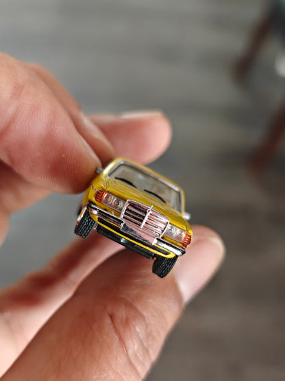 Schuco Mercedes-Benz W123 Sedan - Yellow (Uncarded)
