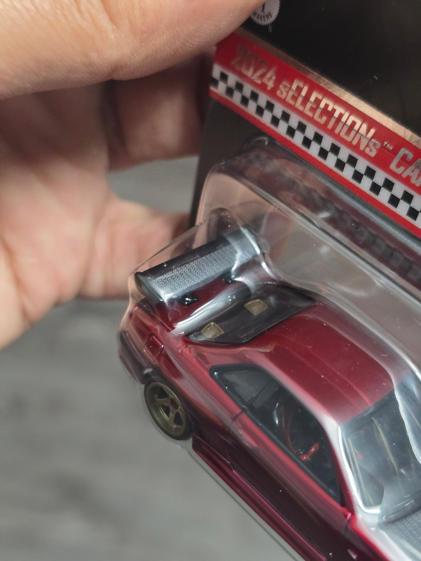 RLC Hot Wheels sELECTIONs Nissan Skyline GT-R BNR34 (Spectraflame Oxblood)