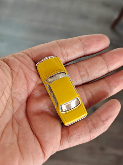 Schuco Mercedes-Benz W123 Sedan - Yellow (Uncarded)