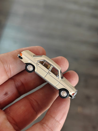 Schuco Mercedes-Benz W123 Sedan - Beige (Uncarded)