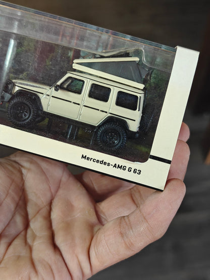Tarmac Works Mercedes - AMG G63 SUV (Cracked Acrylic Case) - Kinder Logs