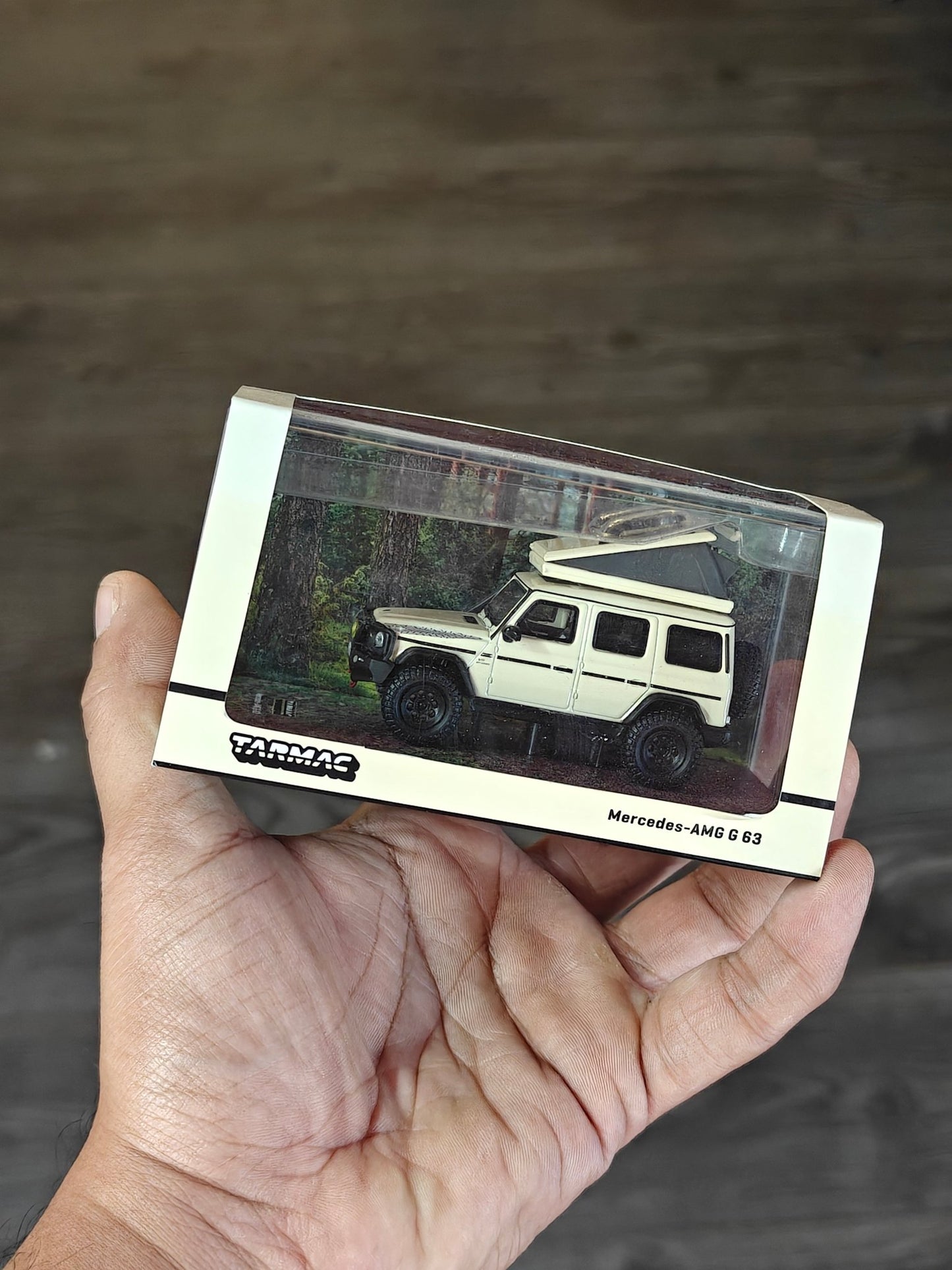 Tarmac Works Mercedes - AMG G63 SUV (Cracked Acrylic Case) - Kinder Logs