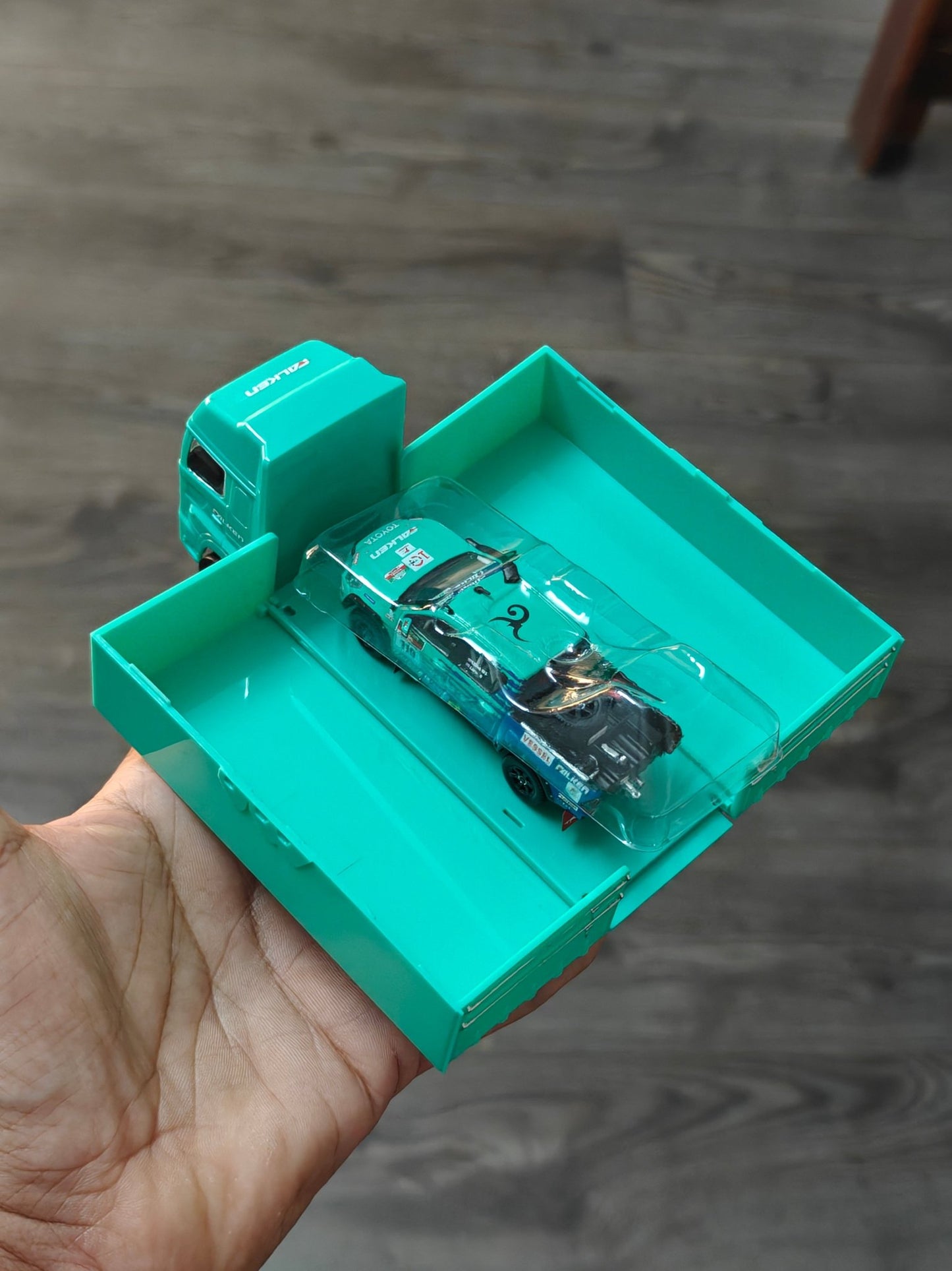 Tarmac Works Toyota Hilux AXCR 2017 with Truck (Open Box) - Kinder Logs