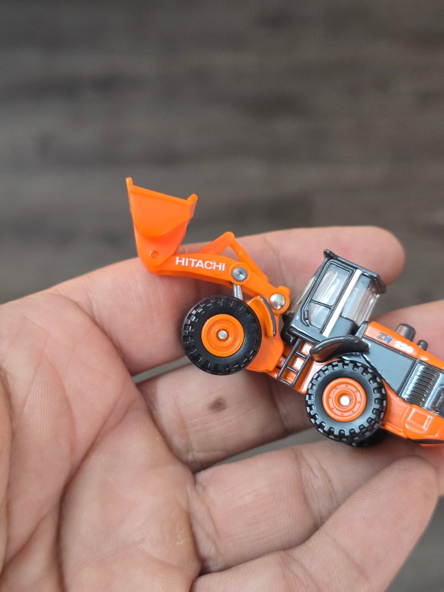 Tomica Hitachi Wheel Loader ZW220 (Uncarded - New) - Kinder Logs