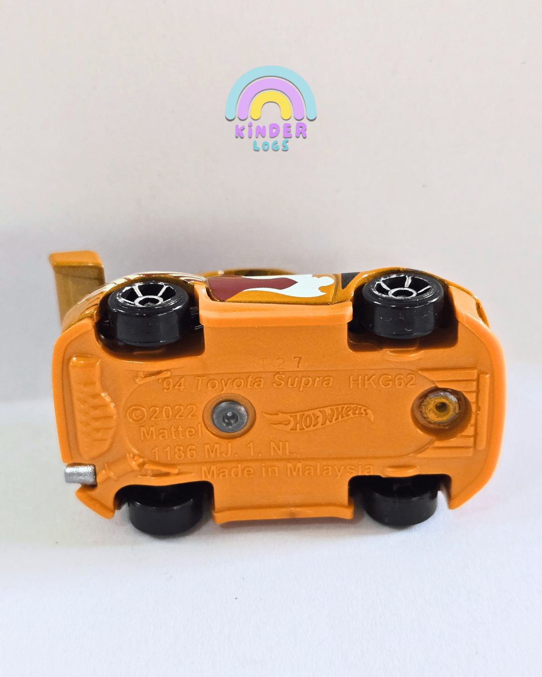 Tooned Hot Wheels 1994 Toyota Supra - Dark Orange (Used Car) - Kinder Logs