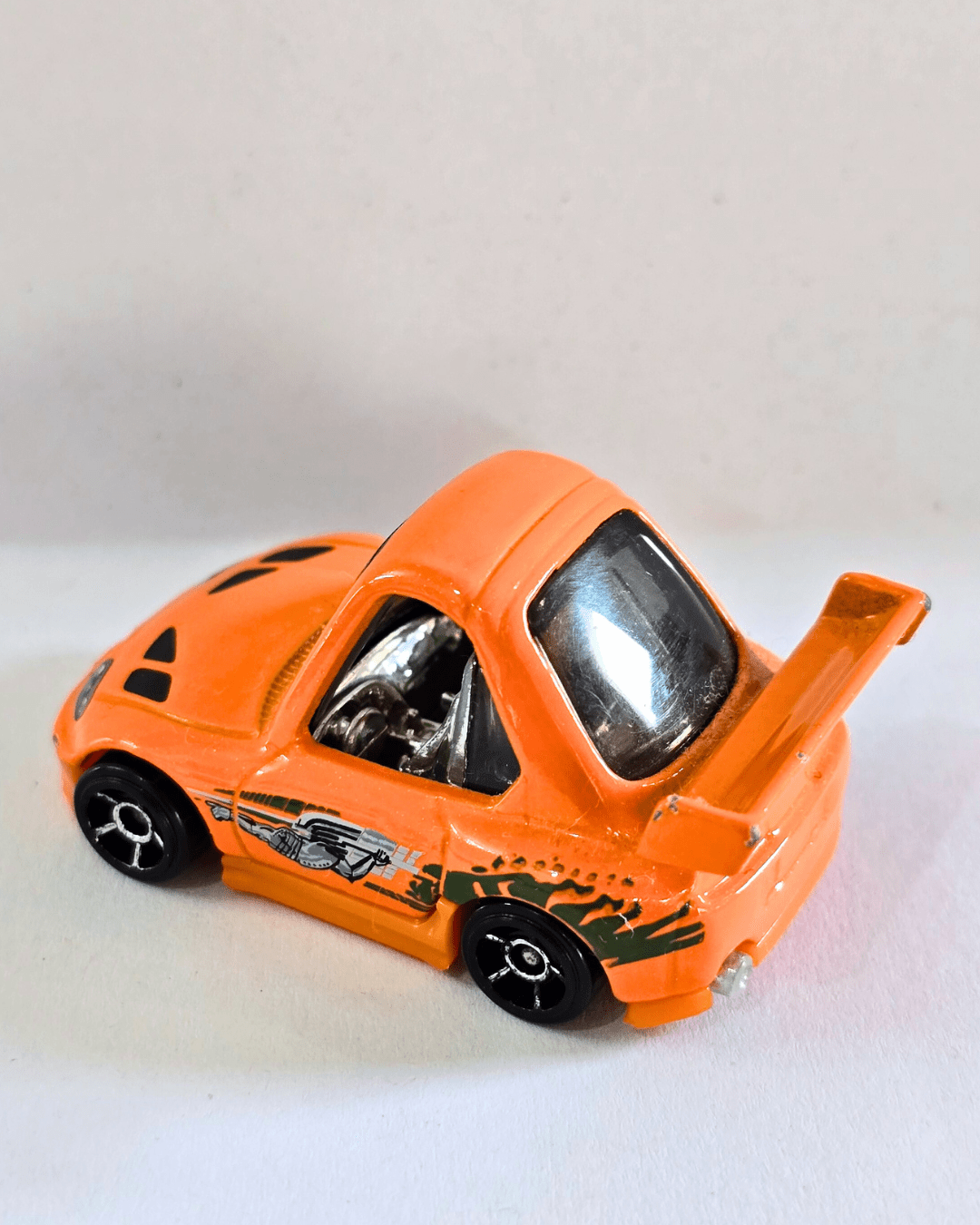 Tooned Hot Wheels 1994 Toyota Supra - Orange (Used Car) - Kinder Logs